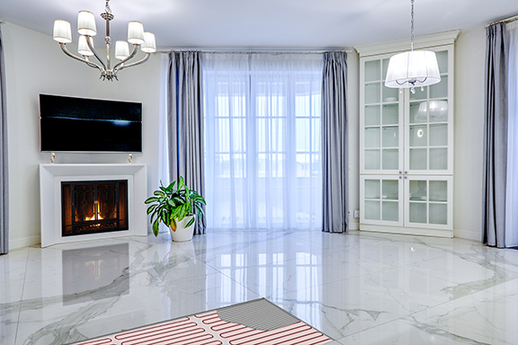 Heated floor with cutaway showing the heat cable and thinset. Heated floor with cutaway showing the heat cable.
